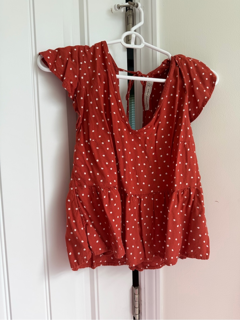 Abercrombie & Fitch Rust Red Dot Peplum shirt